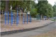 Playground with concrete walking path